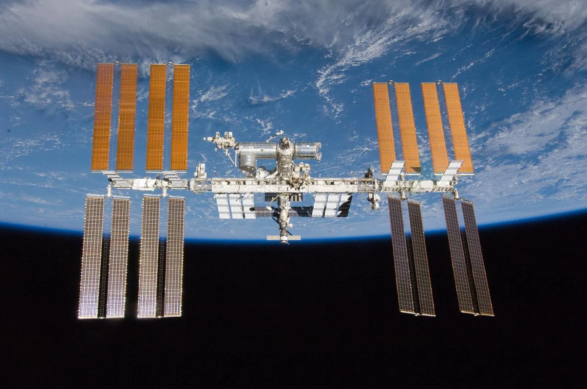 Real photograph of the International Space Station above Earth